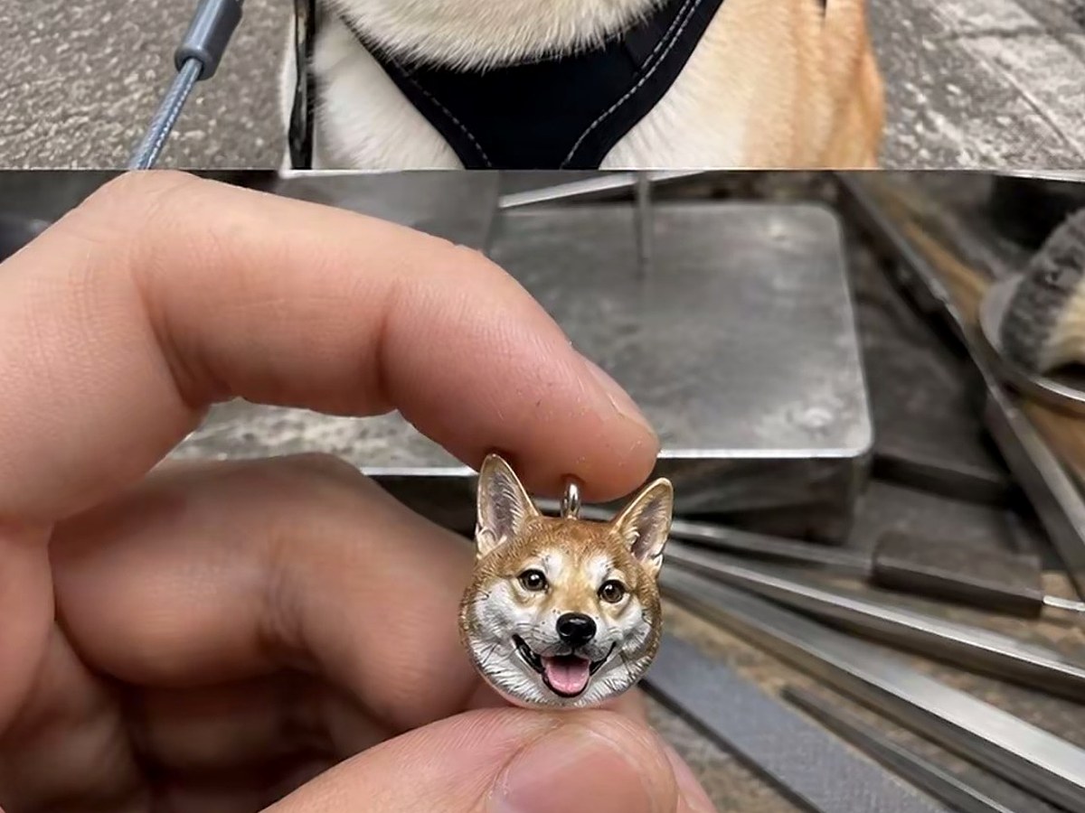 miniature handcrafted silver pet portrait pendant based on a dog photo