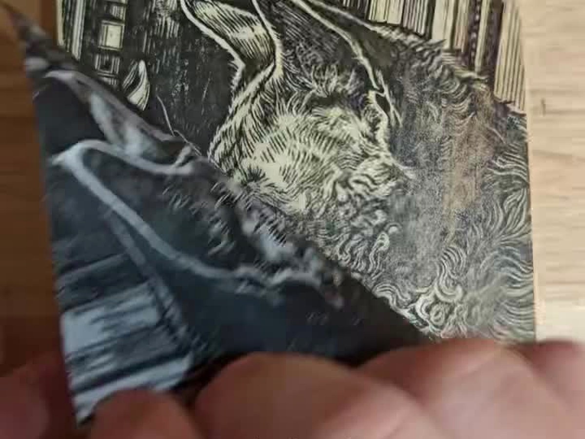 woodblock print in hand